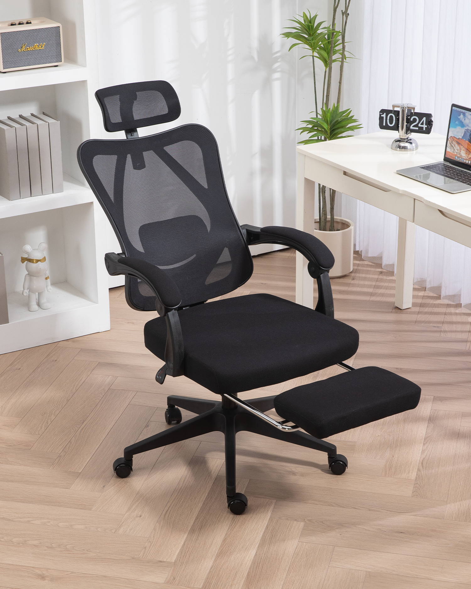 Lepotoimistotuoli jalkatuella Lepotoimistotuoli jalkatuella